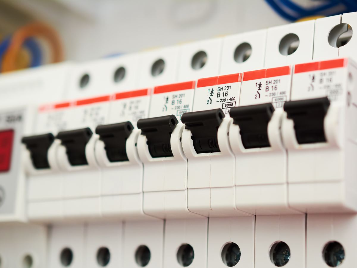 Row of new circuit breakers in a switchboard